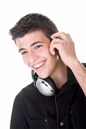 Young man, enjoying music with headphones. Isolated on white. Stock Photo - Budget Royalty-Free & Subscription, Code: 400-04547465