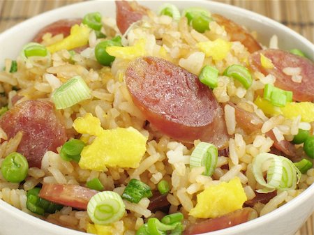 fried rice bowl - A bowl of fried rice with Chinese sausage, eggs, green peas, and green onions. Stock Photo - Budget Royalty-Free & Subscription, Code: 400-04547875