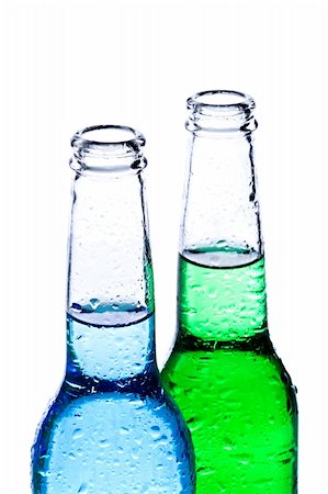 sascha (artist) - alcoholic beverages - wet bottles with blue and green liquid isolated on white Fotografie stock - Microstock e Abbonamento, Codice: 400-04548580
