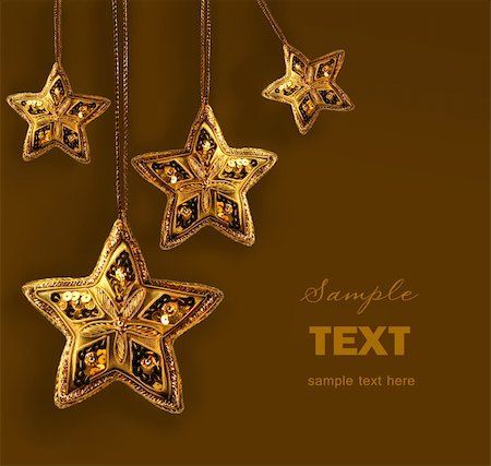 simsearch:400-04073863,k - Gold beaded stars isolated on white abckground Photographie de stock - Aubaine LD & Abonnement, Code: 400-04548653