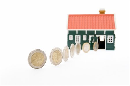 simsearch:649-06532933,k - Row of euro coins rolling into a house - on white background Stock Photo - Budget Royalty-Free & Subscription, Code: 400-04548868