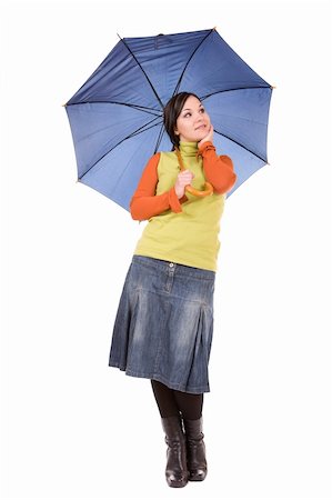 attractive brunette woman with umbrella over white background Photographie de stock - Aubaine LD & Abonnement, Code: 400-04549046