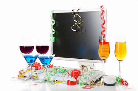3 pair of drink sets with computer and confetti scattered around. Stock Photo - Budget Royalty-Free & Subscription, Code: 400-04549089
