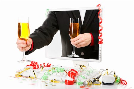 A man in suit is offering a glass of champagne from inside computer's screen. Confetti scattered around the computer. Stock Photo - Budget Royalty-Free & Subscription, Code: 400-04549091