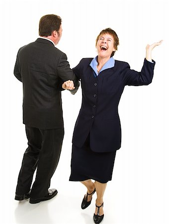 funny businesswoman shoes - Male and femal business partner dancing around joyfully as their business is saved.  Isolated on white. Stock Photo - Budget Royalty-Free & Subscription, Code: 400-04549171