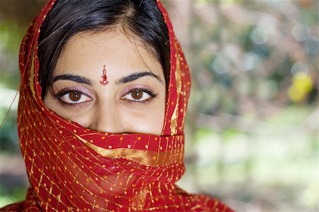young mysterious indian woman in traditional sari Stock Photo - Budget Royalty-Free & Subscription, Code: 400-04549271