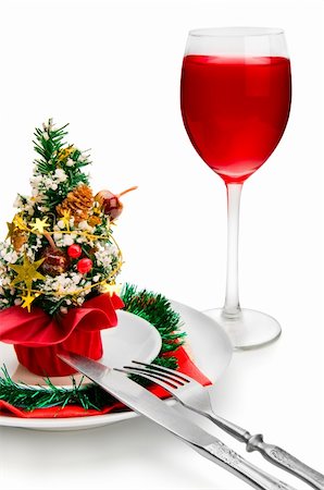 simsearch:400-06477568,k - glass of red wine and Christmas decoration, isolated on white background Stockbilder - Microstock & Abonnement, Bildnummer: 400-04549424
