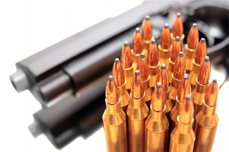 simsearch:400-07984057,k - gold ammo and a handgun depicting gun culture Stockbilder - Microstock & Abonnement, Bildnummer: 400-04549541