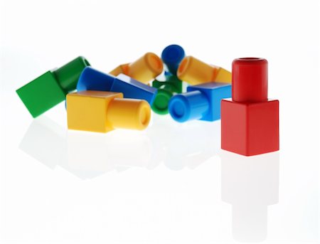 segregazione - The winner. A metaphor on a subject of the winner , it is expressed by children's toys Fotografie stock - Microstock e Abbonamento, Codice: 400-04549637