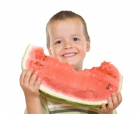 simsearch:400-06177351,k - Boy with a large grin holding a watermelon slice - isolated Stock Photo - Budget Royalty-Free & Subscription, Code: 400-04549925