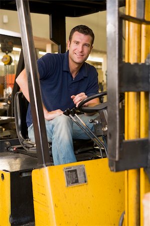 forklift operator (male) - Warehouse worker in forklift Stock Photo - Budget Royalty-Free & Subscription, Code: 400-04540957