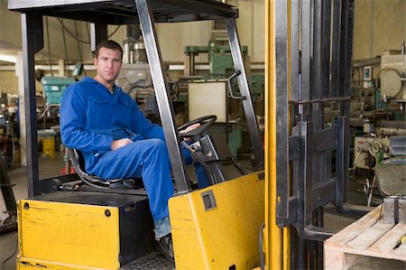 forklift operator (male) - Warehouse worker in forklift Stock Photo - Budget Royalty-Free & Subscription, Code: 400-04540950