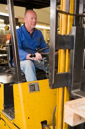 forklift operator (male) - Warehouse worker in forklift Stock Photo - Budget Royalty-Free & Subscription, Code: 400-04540963