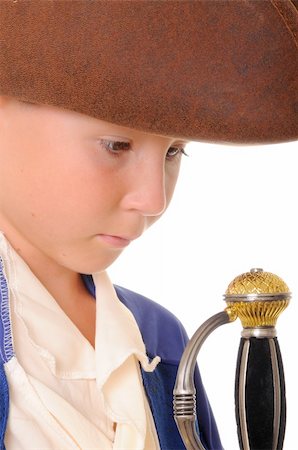 rogues - Boy Pirate isolated on black with a cutlass Stockbilder - Microstock & Abonnement, Bildnummer: 400-04541258