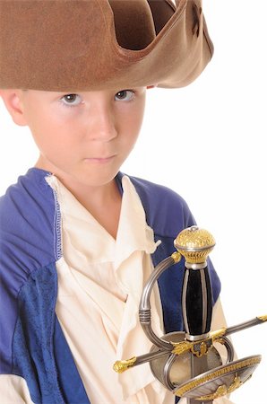 rogues - Boy Pirate isolated on black with a cutlass Stockbilder - Microstock & Abonnement, Bildnummer: 400-04541499