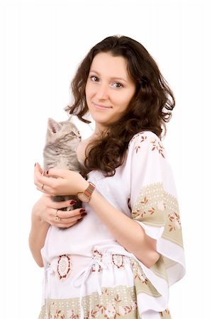 young women with gray kitten on white ground Stock Photo - Budget Royalty-Free & Subscription, Code: 400-04541509