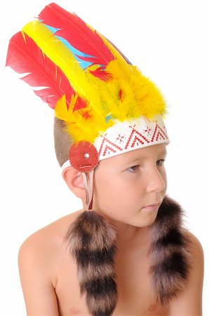 diomedes66 (artist) - Young boy dressed as an American Indian for Halloween Foto de stock - Royalty-Free Super Valor e Assinatura, Número: 400-04541718