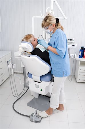 doctor works with patient in the dentist office Stock Photo - Budget Royalty-Free & Subscription, Code: 400-04541766