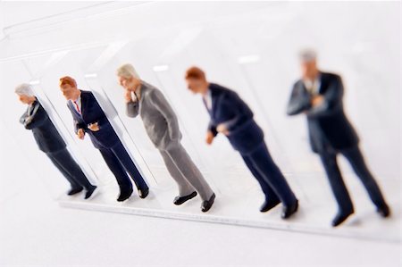 simsearch:649-08145726,k - Line Of Businessmen Figurines Stock Photo - Budget Royalty-Free & Subscription, Code: 400-04542069
