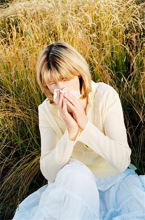 people outside home cold - Woman Blowing Her Nose Stock Photo - Budget Royalty-Free & Subscription, Code: 400-04542189