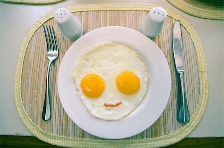 photo of yummy sunny side up egg for breakfast Stock Photo - Budget Royalty-Free & Subscription, Code: 400-04542204