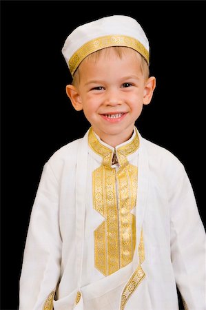 simsearch:400-04547844,k - A cute little 3yr old boy wearing a traditional Arabian thobe for the purpose of asking for Ramadan treats. Stock Photo - Budget Royalty-Free & Subscription, Code: 400-04542370