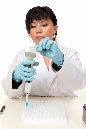 Scientist using an electronic 850µL multi channel pipette and cuvettes Stock Photo - Budget Royalty-Free & Subscription, Code: 400-04542396