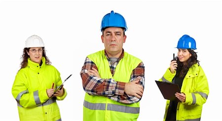 Three construction workers over a white background. Focus at front Stock Photo - Budget Royalty-Free & Subscription, Code: 400-04543272