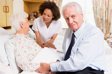 Nurse Talking To Senior Couple Stock Photo - Budget Royalty-Free & Subscription, Code: 400-04543677