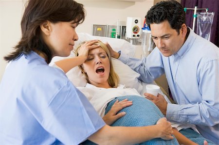 simsearch:400-05261672,k - Woman Giving Birth Stock Photo - Budget Royalty-Free & Subscription, Code: 400-04543726