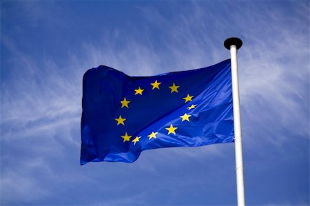 simsearch:400-05136582,k - Waving flag of European union with blue sky background Stockbilder - Microstock & Abonnement, Bildnummer: 400-04543759