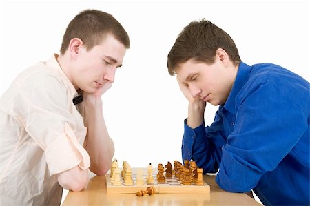 Men play chess on a white background Stock Photo - Budget Royalty-Free & Subscription, Code: 400-04554403