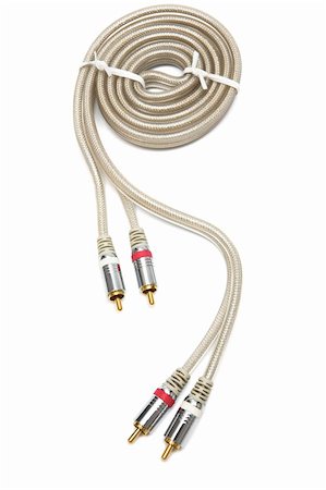 modern audio cable with a gold covering Stock Photo - Budget Royalty-Free & Subscription, Code: 400-04554441