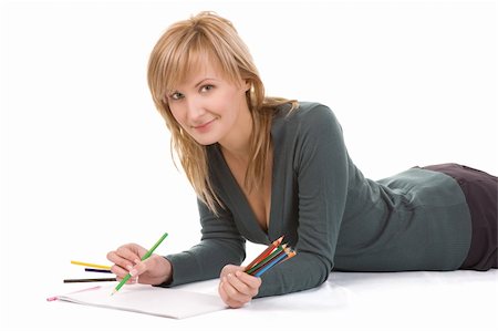 Beautiful young woman is going to draw. Isolated over white. Stock Photo - Budget Royalty-Free & Subscription, Code: 400-04554472