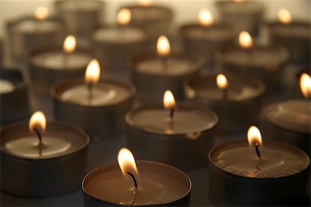 simsearch:640-01364849,k - several burning candles, distance blur, warm brown color Stock Photo - Budget Royalty-Free & Subscription, Code: 400-04554786