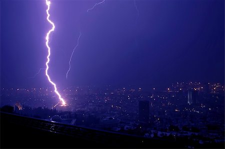 sparking light in sky - Lightning hitting a house Stock Photo - Budget Royalty-Free & Subscription, Code: 400-04555076