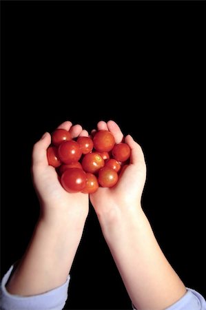 simsearch:400-06384379,k - big handfull of ripe organic farm tomatoes Stock Photo - Budget Royalty-Free & Subscription, Code: 400-04555084