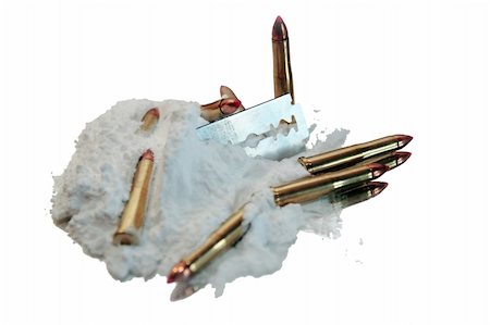 simsearch:400-08796662,k - bullets and drugs showing a dangerous side to life against a white background Stock Photo - Budget Royalty-Free & Subscription, Code: 400-04555082