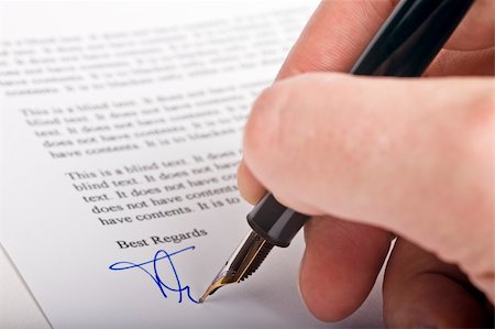 Signing a letter with a fountain pen Stock Photo - Budget Royalty-Free & Subscription, Code: 400-04556407