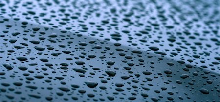 simsearch:695-03382010,k - Drops of water at smooth shiny surface Photographie de stock - Aubaine LD & Abonnement, Code: 400-04556647