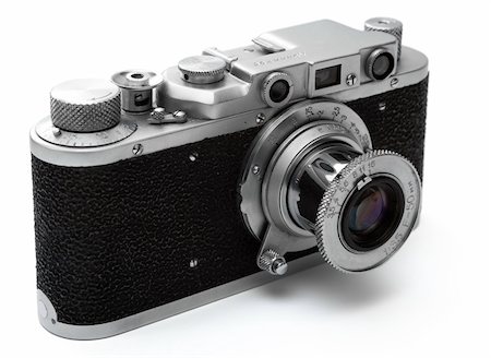 simsearch:400-05664488,k - Old vintage rangefinder camera over white with clipping path Stock Photo - Budget Royalty-Free & Subscription, Code: 400-04556958