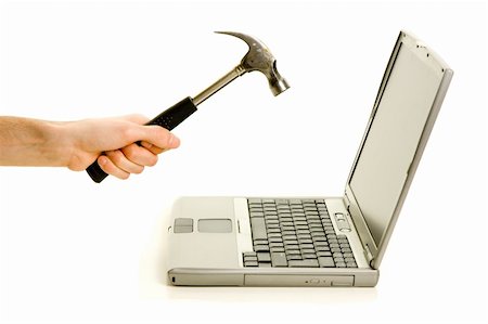 simsearch:400-05200945,k - Smashing laptop with a hammer Fotografie stock - Microstock e Abbonamento, Codice: 400-04557005