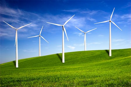 simsearch:400-04024418,k - Beautiful green meadow with Wind turbines generating electricity Fotografie stock - Microstock e Abbonamento, Codice: 400-04557142