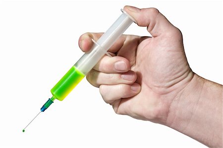 simsearch:400-07754312,k - Syringe with green fluorescent liquid and small drop on a needle in a hand, isolated on white. Photographie de stock - Aubaine LD & Abonnement, Code: 400-04557524