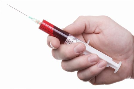 The man's hand holds syringe with red liquid. Isolated on white. Stock Photo - Budget Royalty-Free & Subscription, Code: 400-04557538