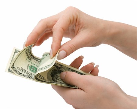 simsearch:400-08282552,k - US Dollars in woman's hand, over white, isolated with clipping path Stock Photo - Budget Royalty-Free & Subscription, Code: 400-04557599