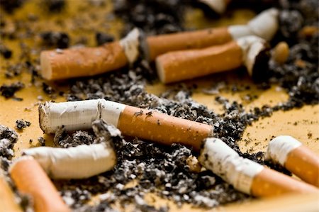 ashes and two cigarette stub in the ash tray Stock Photo - Budget Royalty-Free & Subscription, Code: 400-04557688