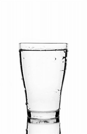 simsearch:400-05291556,k - glass of clean water with reflection (white background) Stock Photo - Budget Royalty-Free & Subscription, Code: 400-04557713