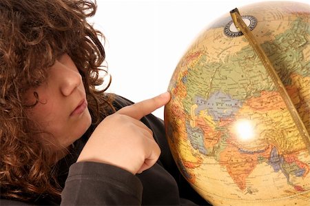 simsearch:400-04633938,k - boys finger pointing on world globe in isolated Stock Photo - Budget Royalty-Free & Subscription, Code: 400-04558056