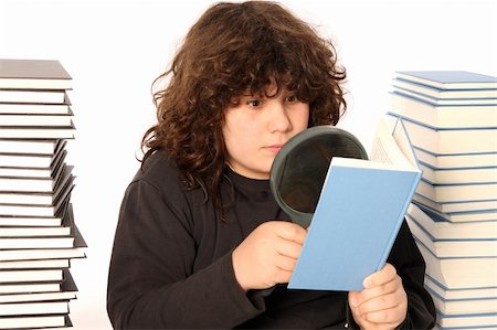 simsearch:400-04558060,k - boy reading a book with lens on white background Foto de stock - Royalty-Free Super Valor e Assinatura, Número: 400-04558053